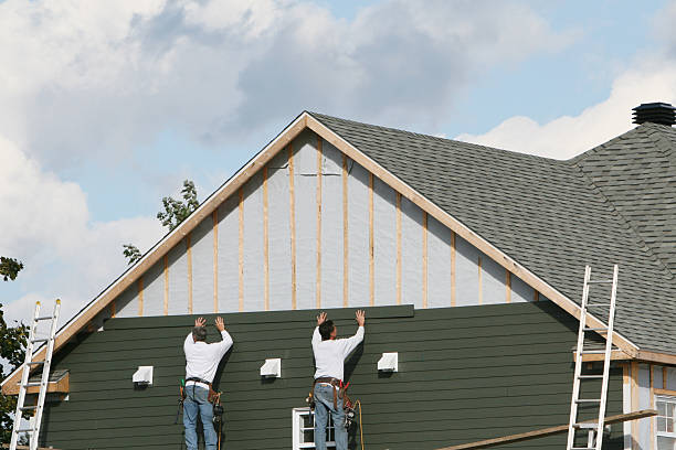 Professional Storm Damage Siding Repair technician working in Stokes, NC